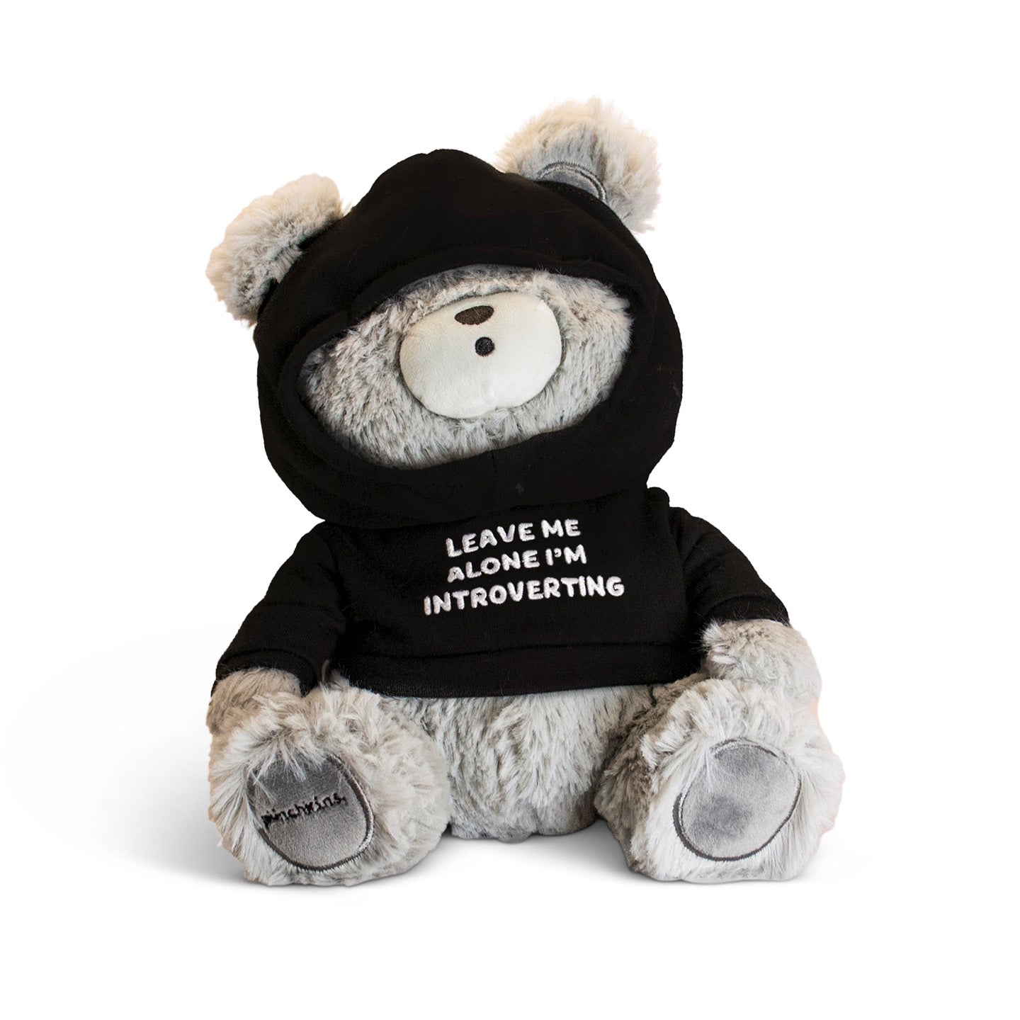 Grey teddy bear wearing black hoodie sweater that reads "Leave Me Alone I'm Introverting"