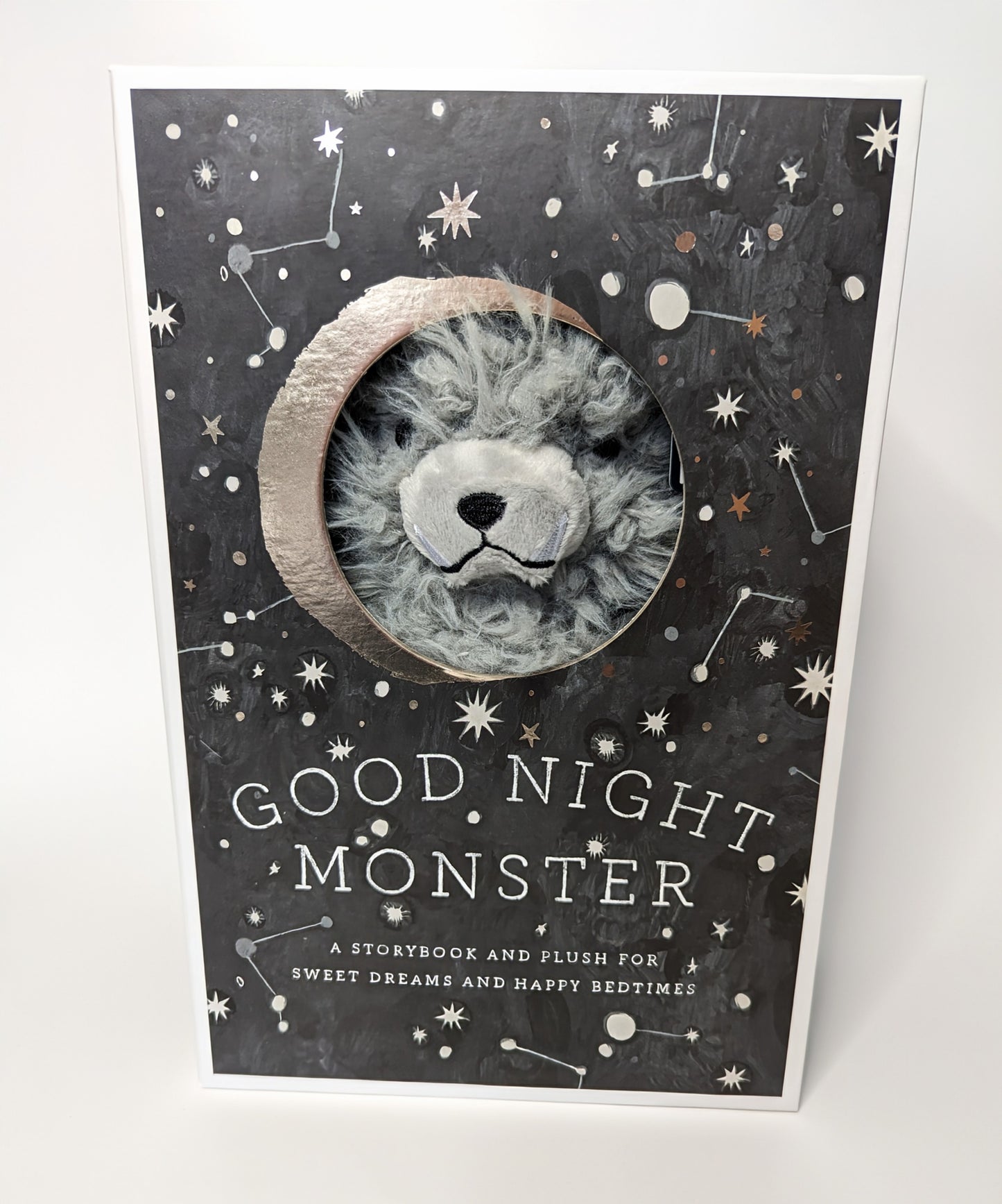 Goodnight Night Monster box with Monster Plush peeking out of box, image of constellation on box